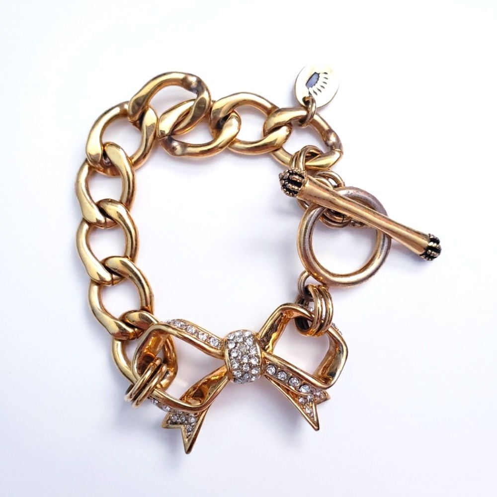 Juicy Couture Black Label Gold Rhinestone Bow Chunky Braclet